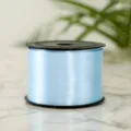 Detailed view of light blue satin ribbon spool for gift wrapping and party balloon decor. - Light Blue