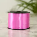 Pink plastic balloon ribbon roll for wedding decoration, gift wrapping, and party crafting supplies. - Rose Red