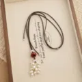 Long beaded necklace with red stone and pearl pendant tassel on adjustable brown cord for women. - Artificial Pearl Grape Cluster Style