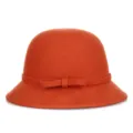 Elegant vintage orange red wool cloche bucket hat for women featuring a small bow ribbon - Rust red