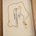 French niche light luxury gold goblet pendant long ball chain necklace unique design sweater - Gold