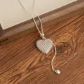 Silver 3D hollow heart pendant necklace with adjustable chain for women fashion jewelry style. - Hollow Heart Drawstring Necklace