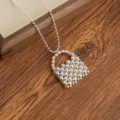 Silver beaded handbag pendant necklace, elegant Korean style fashion jewelry for women. - Metal Ball Bag Necklaces