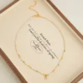 Natural stone beaded necklace for women, stylish vacation style clavicle chain with pendant. - Cat's Eye Beaded Necklaces with Zirconia Pendants