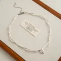 Double-layer pearl silver bead necklace with heart pendant, chic clavicle chain for women. - Wrapped Pearl Heart Necklaces