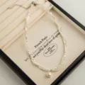 Double layer pearl and silver bead twisted choker necklace with cute smiley cube pendant chic. - Wrapped Pearl Square & Smiley Face Necklaces