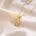 Close-up detail of the dazzling rotating sunflower pendant necklace, sparkling cubic zirconia. - Gold Sunflower (X0567)