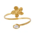 Gold metal open arm cuff bracelet with a textured flower and baroque pearl design. - Arm Cuff / Gold