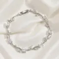 Silver plated branch bracelet with sparkling cubic zirconia leaves, elegant Korean style. - White Main Stone Vine Silver (TS0475)