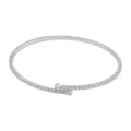 Detailed close-up of a silver flexible rhinestone spring bracelet and sparkling crystal arm ring. - 1-Loop Silver-Tone