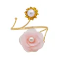 Metal curtain tieback detail featuring pink fabric flower and pearl sunflower design. - Pink and Gold