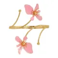 Gold tone open arm cuff bracelet featuring charming pink floral accents and delicate branch details. - Pink