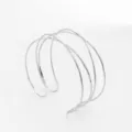 Geometric multi-layer open silver cuff bracelet, stylish wavy wire metal arm ring for women - Double Cross Silver-Tone