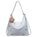 Zaino e borsa a tracolla elegante in pelle azzurra con simpatico ciondolo in peluche di orsetto. - Blu