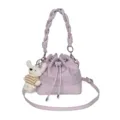 Purple bucket bag with braided handle, star prints, and cute rabbit plush keychain accessory. - Purple