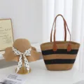 Detailed view of summer straw sun hat with polka dot ribbon and striped beach tote bag set. - Hat & Bag Set / Khaki And Black