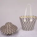 Detailed view of colorblock straw woven tote bag and matching sun hat set, spacious design. - Single Hat / Black