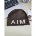 Stylish wool-blend knitted beanie with letter pattern, soft and warm autumn winter hat. - One Size / Coffee