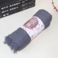 Dark gray cotton linen rolled scarf featuring fringe details and decorative printed belly band - Dark Gray