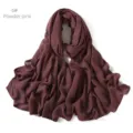 Detailed view of the solid color modal cotton scarf shawl in powder pink variant. - Leather Red