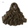 Solid olive green modal cotton hijab scarf for women, soft daily draping detail view. - Deep Olive Green