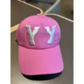 Stylish pink washed distressed baseball cap featuring bold white YY embroidery for daily casual wear. - Pink