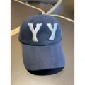 Washed distressed denim baseball cap with white embroidered YY letters for casual daily wear. - Navy Blue