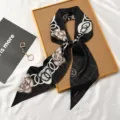 Chic black silk twilly scarf with floral and geometric print, elegant neck accessory for women. - Elegant Black Striped