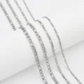 Stainless steel Figaro chain variant showcasing multiple thickness options in silver finish. - 5mm Width - 55cm Length / Steel
