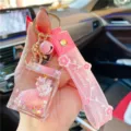 Roze vloeibare eenhoorn melkdoos sleutelhanger met schattige band, draagbare autosleutel accessoire. - Roze melkpak eenhoorn