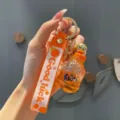 Vloeibare drift fles sleutelhanger met oranje band leuke creatieve tas bedel - Cola-fles - oranje