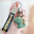 Groene 3D gefacetteerde dinosaurus sleutelhanger met zwarte lederen band voor tas leuk - Groen