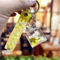 Yellow liquid perfume bottle unicorn keychain, cute floating star charm bag pendant ring. - Perfume Bottle Unicorn-Yellow