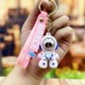 Schattige cartoon astronaut siliconen sleutelhanger, stijlvolle tas hanger accessoire - Stoere astronaut - roze