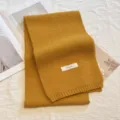 Cozy yellow knitted winter scarf for women, soft solid color wool neck warmer for cold weather. - Solid Ginger