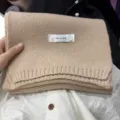 Cozy winter solid color knitted scarf for women, warm and stylish Japanese style neck warmer accessory. - Khaki