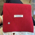 Red knitted wool blend scarf with decorative shell pendant and label cozy warm winter neck warmer - Red
