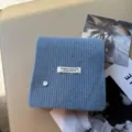 Cozy light blue knit scarf with handmade label and shell button, thick warm winter accessory. - Light Blue