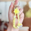 Leuke gele siliconen regenboog ster sleutelhanger met metalen ring hanger accessoire. - Regenboog ster zachte rubberen armband - Geel