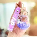 Creatieve vloeibare glitter eenhoorn sleutelhanger, schattige paarse hanger voor tassen. - Maan Eenhoorn / Dromerig Paars