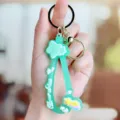 Cute green drift bottle silicone keychain with rainbow and stars, stylish bag charm pendant. - Rainbow Star Silicone Wristband - Green