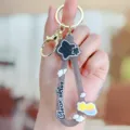 Cute silicone keychain with star and rainbow charm, stylish metal keyring accessory. - Rainbow Star Silicone Wristband - Black