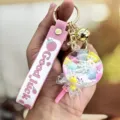 Leuke vloeibare zandloper lolly sleutelhanger voor dames, stijlvolle rugzak hanger en cadeau. - crème
