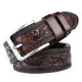 Detail shot of men's brown leather belt with exquisite carved floral embossing and alloy buckle. - 105cm / Coffee
