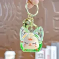 Leuke groene quicksand acryl sleutelhanger en tassenhanger met een kleine bel voor sleutels. - Individuele Verpakking / Knipperende vossekop - Groen