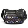 Black nylon crossbody bag for women, multi-zipper compartments, stylish colorful circle print. - Colorful Bubbles