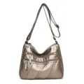 Borsa a tracolla da donna grigio metallizzato alla moda con zip multiple, pelle morbida. - Bronzo