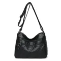 Borsa a tracolla da donna in morbida pelle lavata nera con tasche multiple con zip. - Nero