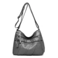Grey washed soft leather crossbody shoulder bag with multi zippers, casual daily use variant. - Gray