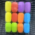 Colorful EVA pen grips set for handwriting posture correction, 12 pieces per pack. - Sponge Pencil Grips (Pack of 12)